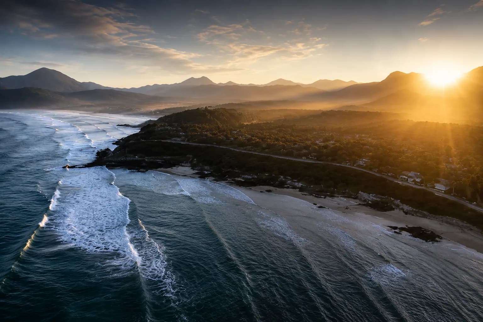 Aerial coastal landscape at sunset